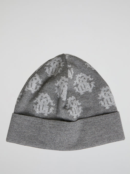 Elevate your winter wardrobe with the grey logo beanie from Roberto Cavalli. Crafted with premium materials and featuring the iconic logo, this beanie offers both style and functionality for the modern fashion enthusiast. Stay cozy and confident wherever you go with this must-have accessory.