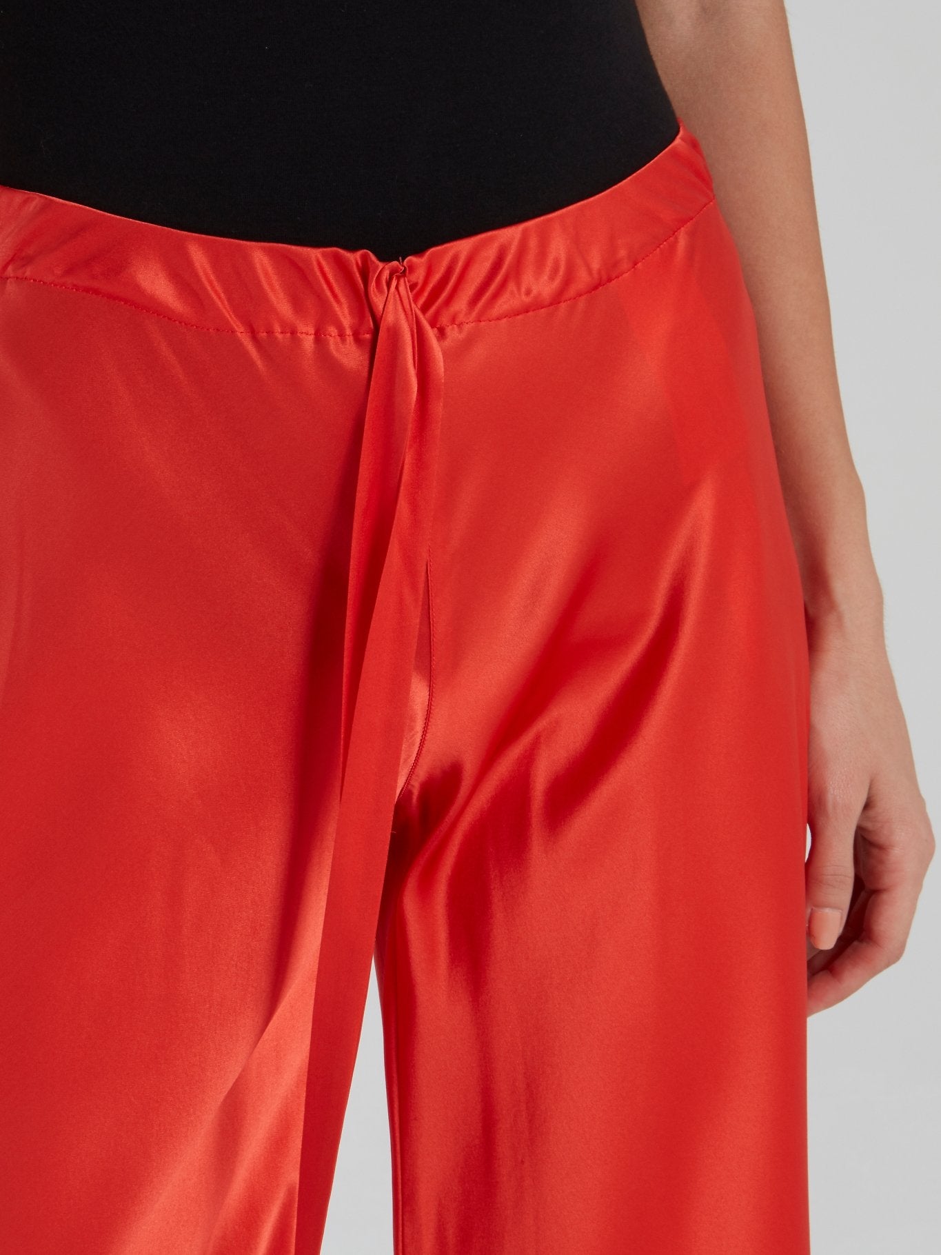Красные длинные брюки из сатина