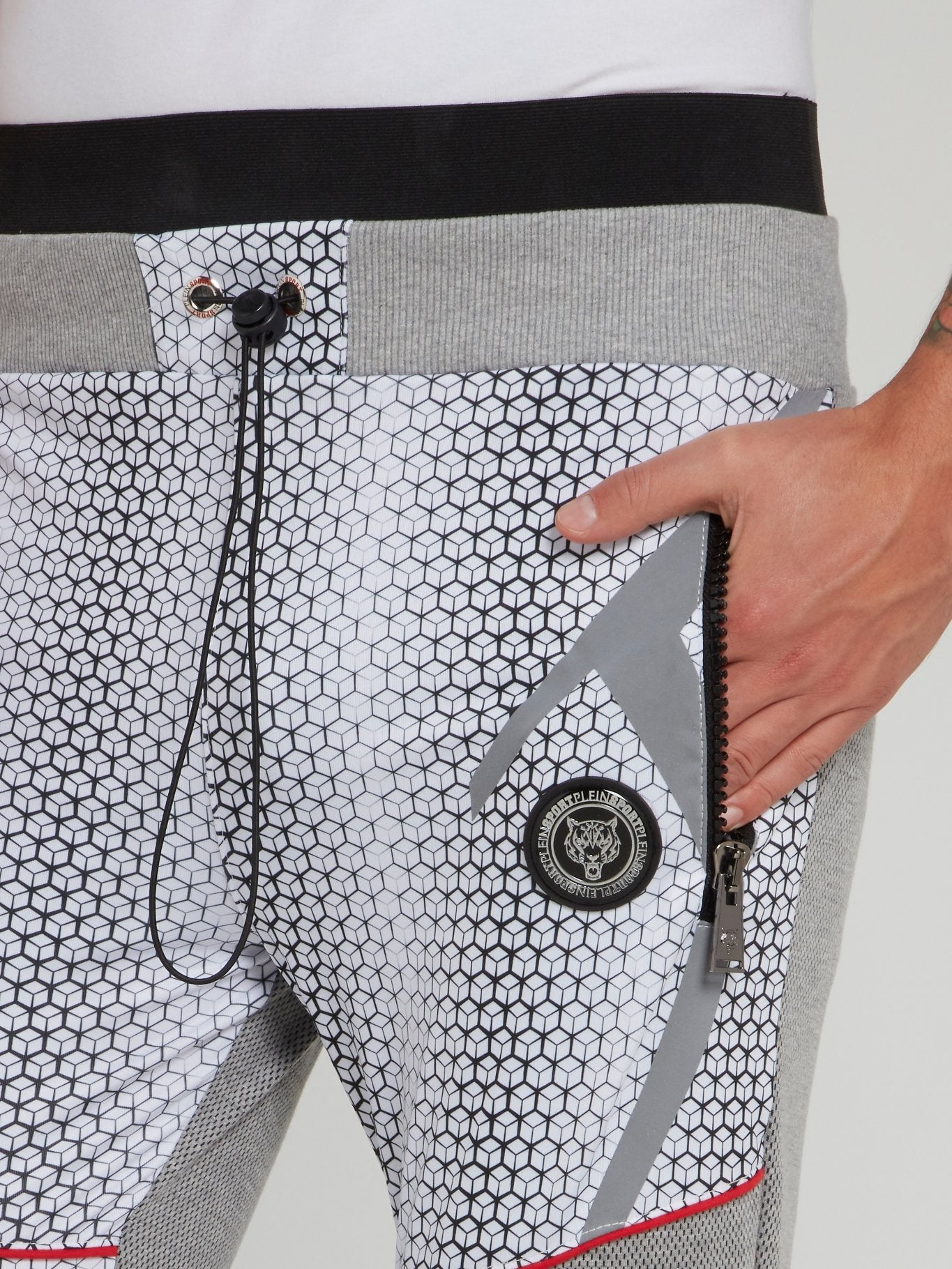 Серые спортивные брюки с геометрическим принтом Klaas