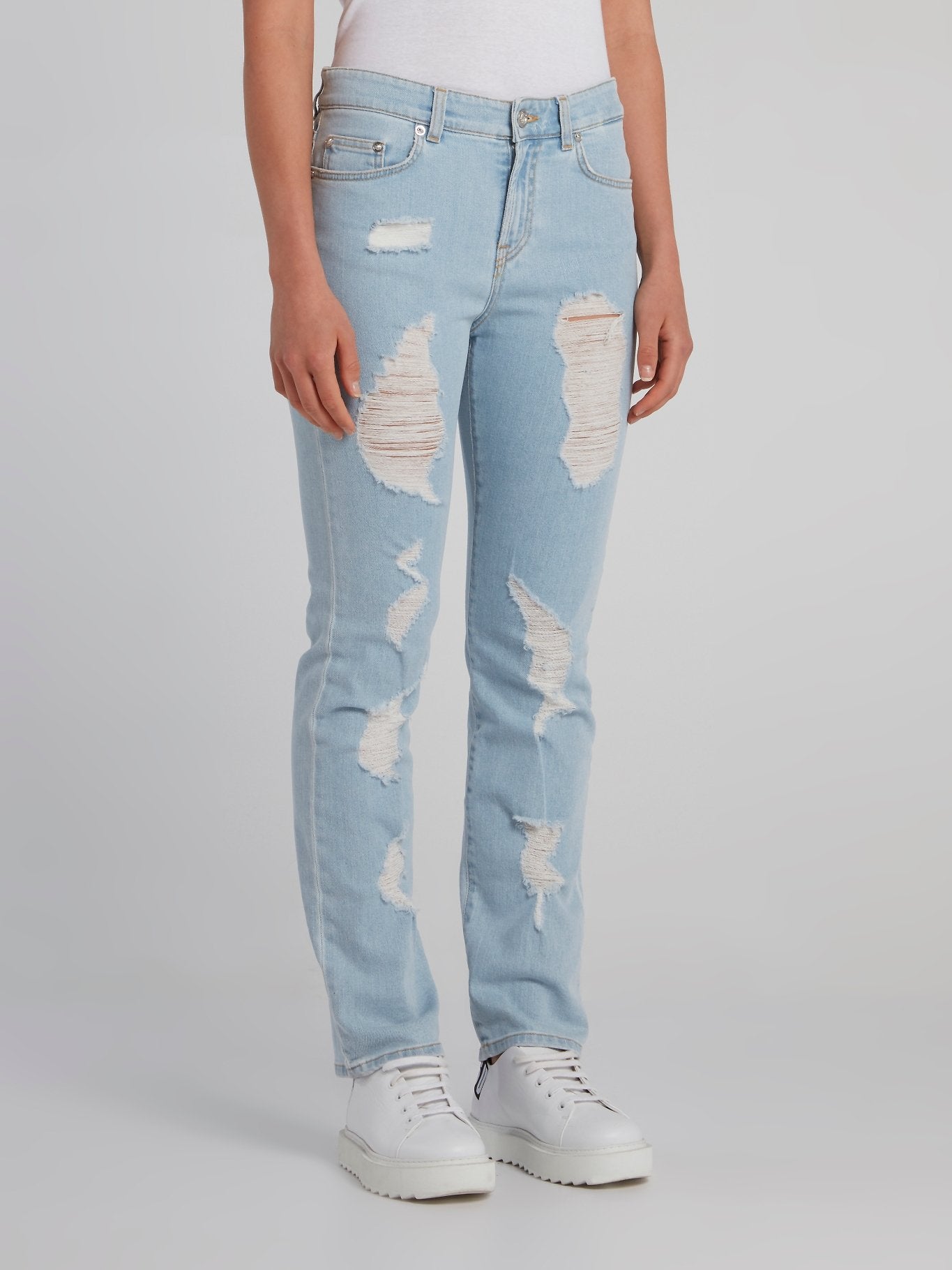 Tattered blue fashion jeans