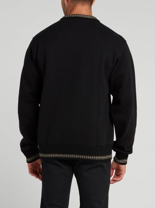Черный свитер с изображением змеи