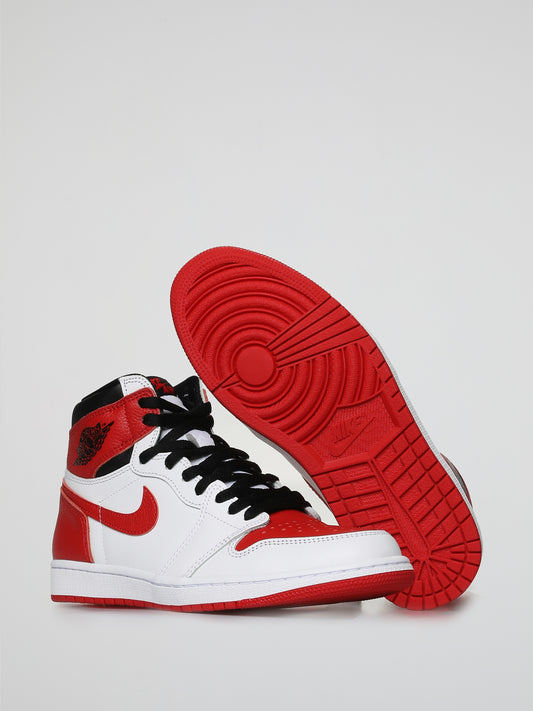 Step into a world of timeless style with the Air Jordan 1 Retro High OG Heritage Sneakers. Crafted to perfection by Nike, these kicks are a striking blend of heritage and innovation. Whether you're rocking them on the court or on the streets, these sneakers are bound to turn heads with their iconic design and unmatched comfort.