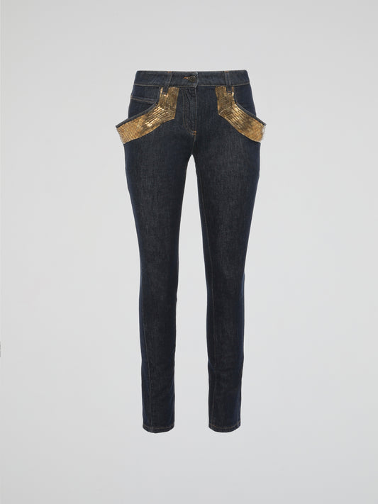 Introducing our Embellished Fitted Jeans by the legendary fashion house Roberto Cavalli, where classic denim is elevated to a new level of opulence. Crafted with meticulous attention to detail, these jeans feature exquisite embellishments that cascade down the sides, creating a captivating and eye-catching effect. Flaunt your individuality and make a bold statement with these dazzling jeans, ensuring a show-stopping look that effortlessly blends sophistication and glamour.