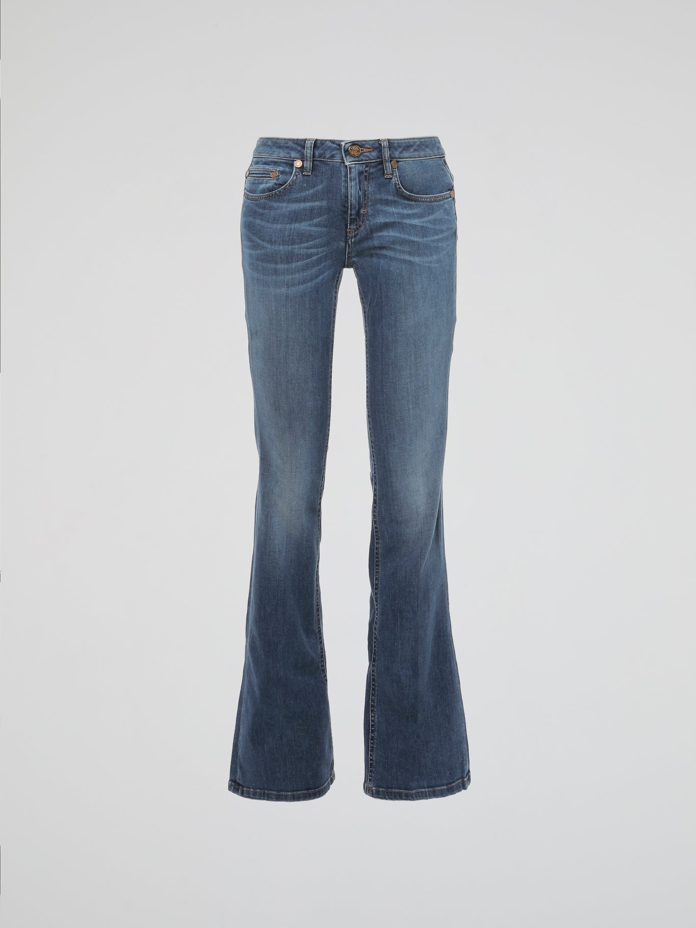 Step into a world of timeless elegance and contemporary finesse with Roberto Cavalli's Flared Denim Jeans. Crafted with meticulous attention to detail, these jeans effortlessly blend sophistication and comfort. From morning strolls to glamorous evenings, these flared denim jeans are your ultimate sartorial companion, making a bold statement wherever you go.