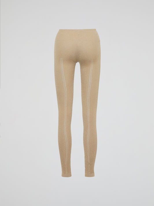 Wrap your legs in luxurious comfort and style with our Beige Knitted Leggings by Roberto Cavalli. Made from the finest quality fabrics, these leggings are expertly designed to provide a seamless fit that sculpts and contours your silhouette flawlessly. Whether you're lounging at home or stepping out for a night on the town, these leggings are the perfect blend of elegance and relaxation.