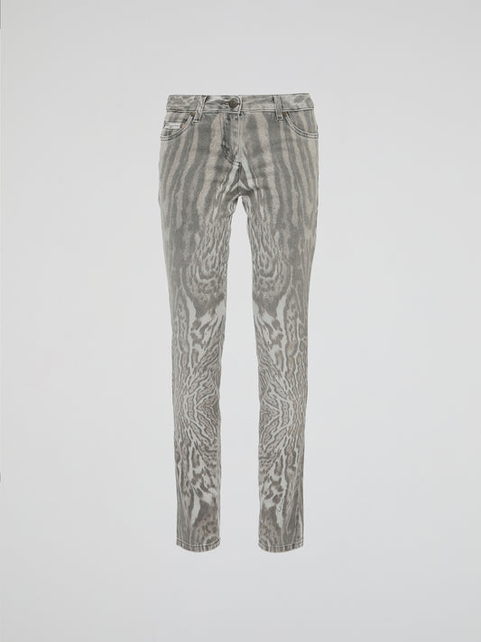 Step into the wild side of fashion with Roberto Cavalli's Animal Print Jeans, a fierce and daring addition to your denim collection. Crafted with impeccable precision, these jeans effortlessly fuse a touch of untamed allure with a classic silhouette. Showcasing the iconic Cavalli style, these statement pieces promise to bring out your inner fashion predator wherever you go.