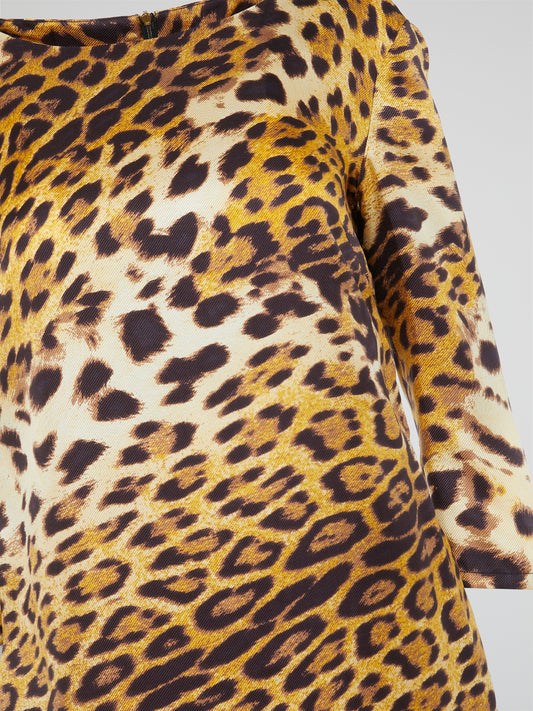 Release your inner wild side with the Yellow Leopard Print Dress by Clas Roberto Cavalli. Roaring with style, this dress boasts a fierce leopard print pattern in a striking yellow hue that is sure to turn heads. With its body-hugging silhouette and luxurious fabric, this dress is the perfect statement piece for any glamorous occasion.