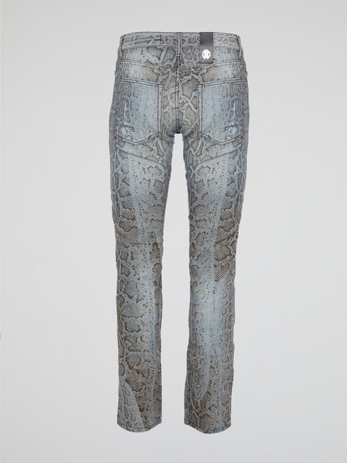 Unleash your wild side with the Roberto Cavalli Snake Print Denim Jeans, a bold and daring addition to your wardrobe that will turn heads wherever you go. Crafted from high-quality denim, these jeans feature a sleek snake print design that adds a touch of edgy sophistication to any outfit. Embrace your inner fashionista and elevate your style with these statement-making jeans that are sure to make you stand out from the crowd.