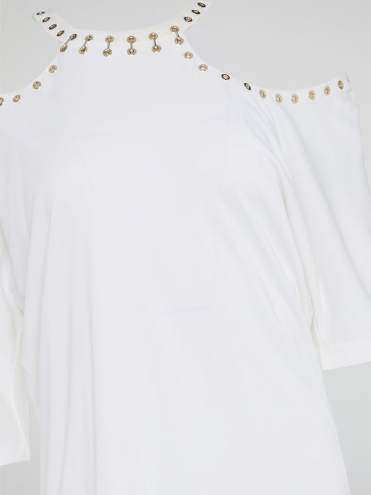 Wrap yourself in effortless elegance with the White Cold Shoulder Top by Roberto Cavalli. This stunning piece boasts intricate detailing and a modern silhouette that will turn heads wherever you go. Elevate your wardrobe with this must-have statement piece that exudes timeless sophistication and style.