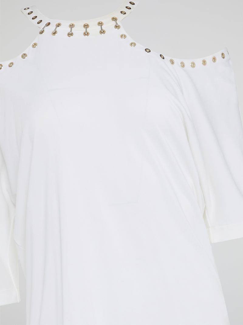 Wrap yourself in effortless elegance with the White Cold Shoulder Top by Roberto Cavalli. This stunning piece boasts intricate detailing and a modern silhouette that will turn heads wherever you go. Elevate your wardrobe with this must-have statement piece that exudes timeless sophistication and style.