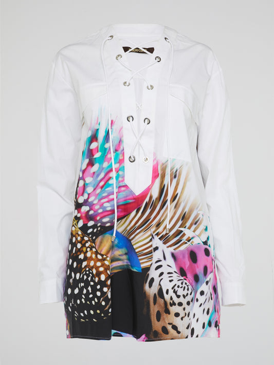 Elevate your wardrobe with the Abstract Print Lace Up Blouse from Roberto Cavalli - a bold and unique piece that exudes confidence and style. Featuring a stunning abstract print and eye-catching lace-up detailing, this blouse is sure to turn heads wherever you go. Make a statement and stand out from the crowd with this must-have addition to your closet.