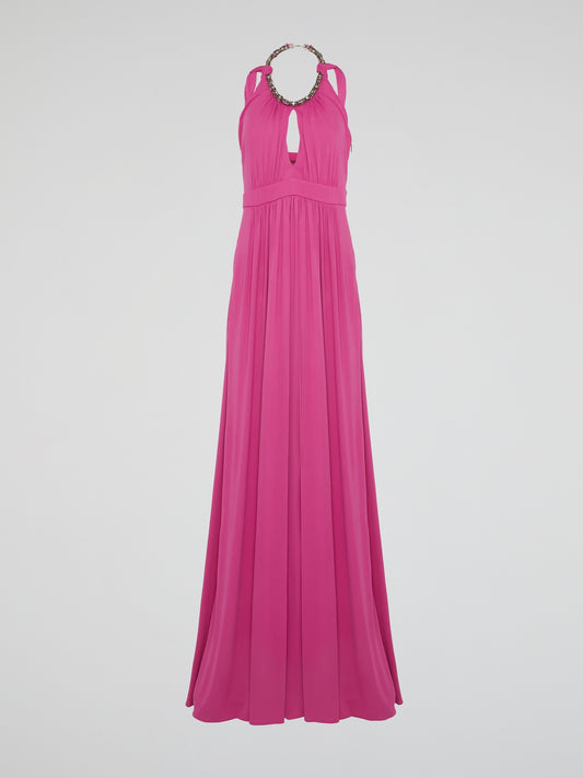 Channel your inner goddess in this stunning Pink Crystal Embellished Halter Neck Maxi Dress by Roberto Cavalli. The luxurious crystals add a touch of glamour to the flowy silhouette, making it perfect for any special occasion. Stand out from the crowd and turn heads wherever you go in this show-stopping piece.