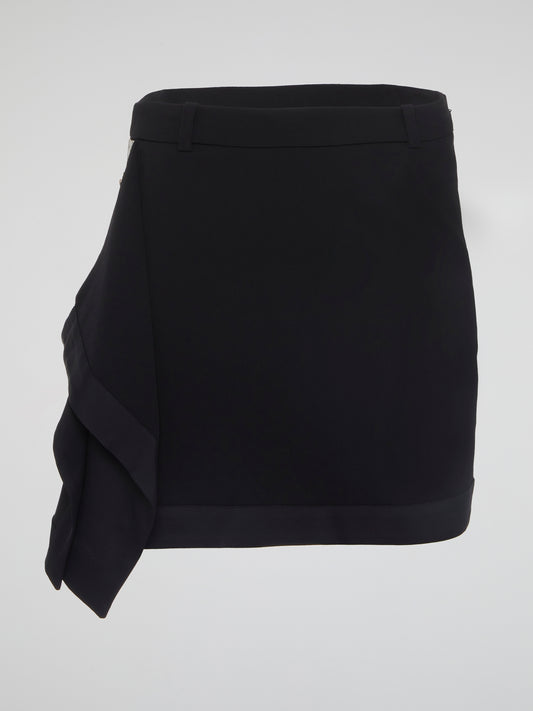 Dive into a world of bold, edgy style with our Black Asymmetrical Mini Skirt by Roberto Cavalli. This statement piece is perfect for the fashion-forward individual who is unapologetically confident in their unique sense of style. Stand out from the crowd and make a fierce statement with this must-have wardrobe staple.