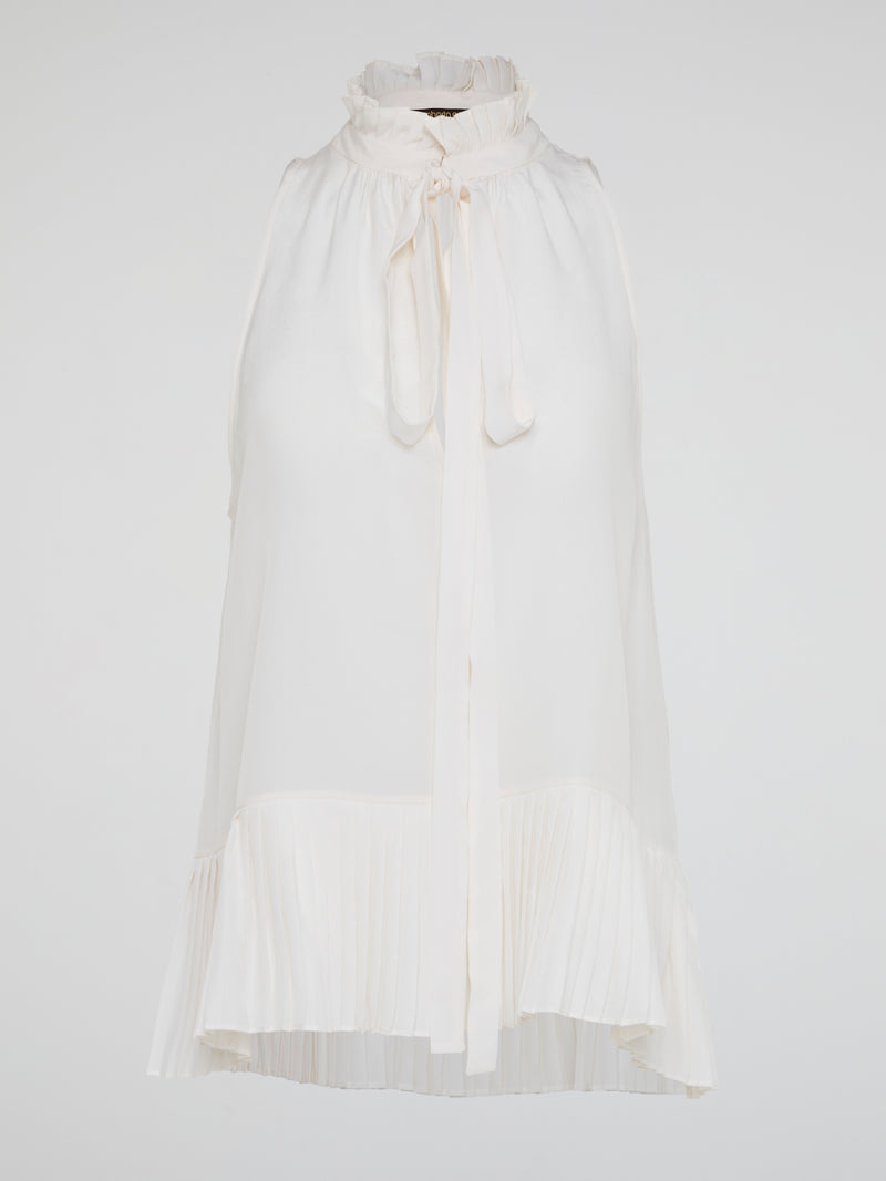 Elevate your summer wardrobe with the White Sleeveless Frill Top by Roberto Cavalli, a chic and feminine piece that exudes effortless elegance. Crafted with impeccable tailoring and delicate frill details, this top is perfect for any occasion, from casual brunches to evening soir茅es. Embrace your inner fashionista and turn heads wherever you go with this must-have addition to your closet.