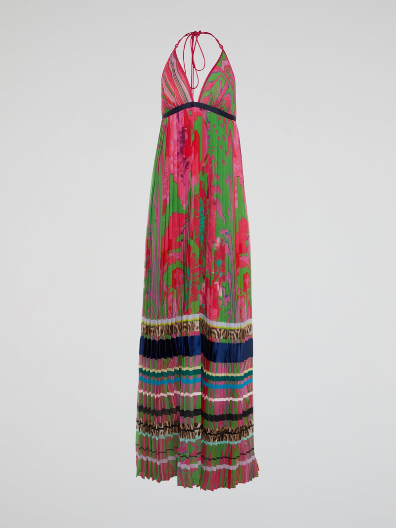 Feel like a bohemian goddess in this stunning halter neck accordion maxi dress by Roberto Cavalli. The flowing fabric drapes beautifully, while the halter neck adds a touch of sophistication to the look. Perfect for a summer wedding or a night out on the town, this dress will make you feel effortlessly chic and stylish.