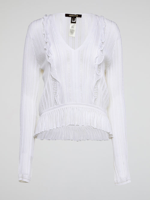 Elevate your wardrobe with the White Rib Knit Long Sleeve Top from Roberto Cavalli. Crafted with luxurious ribbed fabric, this top boasts a flattering silhouette and a timeless white hue perfect for any occasion. Embrace effortless elegance and make a statement with this must-have wardrobe staple.