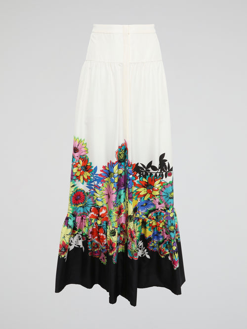 Dance through fields of wildflowers in the Roberto Cavalli Floral Print Maxi Skirt, where whimsical blooms cascade down the flowing fabric like a waterfall of petals. As you twirl and sway in this dreamy piece, the vibrant colors and intricate details will make you feel like a walking work of art. Embrace your inner free spirit and let this skirt be your muse, inspiring envious glances and sparking conversations wherever you go.