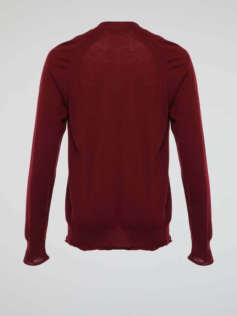 Wrap yourself in luxurious comfort with the Burgundy Knitted Sweatshirt by Roberto Cavalli. Crafted from ultra-soft materials, this enchanting garment envelops you in warmth while showcasing Cavalli's signature elegance. The stunning burgundy hue and intricate knitted pattern make this sweatshirt a standout piece, perfect for adding a dash of sophistication to your everyday wardrobe.