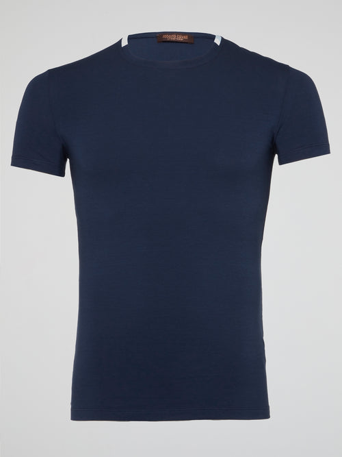 The Navy Logo Print Round Neck T-Shirt by Roberto Cavalli Underwear is a striking statement piece for anyone looking to elevate their casual wardrobe. With the iconic logo print front and center, this tee exudes luxury and style. Perfect for adding a touch of sophistication to your everyday look.