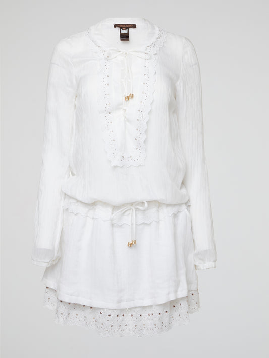 Indulge in the intricate charm of this ethereal white lace up boho dress by Roberto Cavalli, designed to make you feel like a goddess gliding through a field of wildflowers. The delicate lace detailing and flattering silhouette will have you twirling with joy at every summer soiree and beachside sunset. Embrace your inner bohemian spirit and set the trend with this timeless piece that exudes effortless elegance and feminine allure.