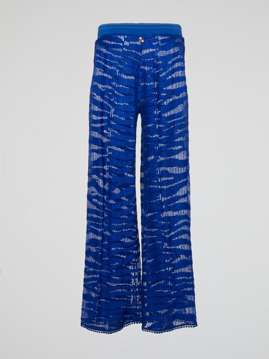 Elevate your everyday style with these stunning Blue Lace Palazzo Pants by Roberto Cavalli. Crafted with intricate lace detailing and a flowing silhouette, these pants are perfect for making a bold fashion statement. Pair them with a simple tank top and some statement jewelry for a chic and sophisticated look that is sure to turn heads wherever you go.