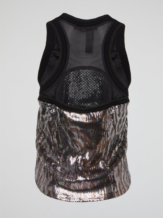 This Sleeveless Sequin Top by Roberto Cavalli is an absolute showstopper, shimmering and shining with every movement you make. The intricate sequin detailing exudes luxury and sophistication, perfect for a night out on the town. Make a statement and turn heads wherever you go with this stunning and unique piece from Roberto Cavalli.