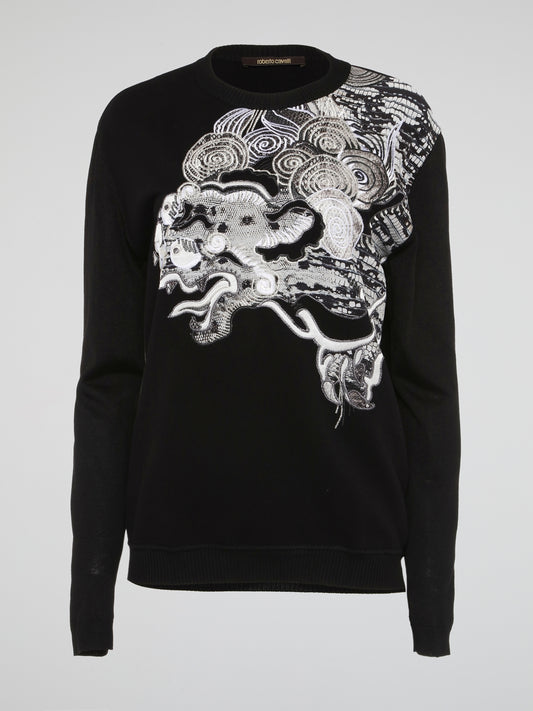 Feel effortlessly stylish and cozy in this Roberto Cavalli Black Embroidered Sweatshirt. The intricate embroidery adds a touch of elegance to this classic wardrobe staple, perfect for both casual outings and relaxing at home. Embrace your individuality and stand out from the crowd with this luxurious sweatshirt.