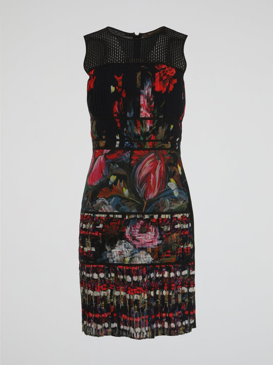 Get ready to turn heads with the Floral Print Pleated Dress by Roberto Cavalli. This exquisite ensemble boasts a vibrant burst of colors with its beautifully crafted floral print that dances gracefully across the fabric. The pleated skirt adds an element of elegance and movement, making it the perfect dress for any occasion.