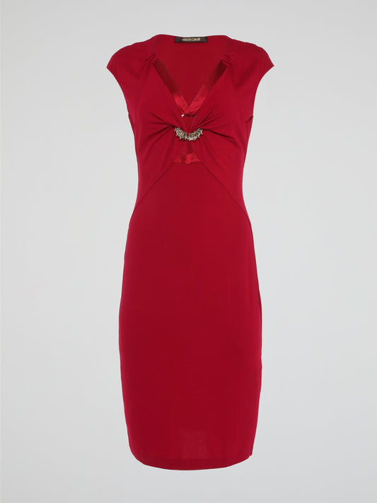 Turn heads wherever you go with the Red Embellished Bodycon Dress by Roberto Cavalli. This statement-making stunner features intricate embellishments that beautifully catch the light, adding a touch of glamour to your every move. With its figure-hugging silhouette and bold red hue, this dress is the perfect choice for making a lasting impression at any special occasion.