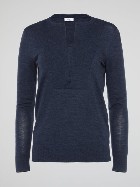 Wrap yourself in effortless style with the Navy Long Sleeve Top by Akris Punto. Crafted with the utmost attention to detail, this versatile piece exudes sophistication whilst offering unrivaled comfort. Elevate your wardrobe and make a statement with this chic and timeless addition that seamlessly takes you from day to night.