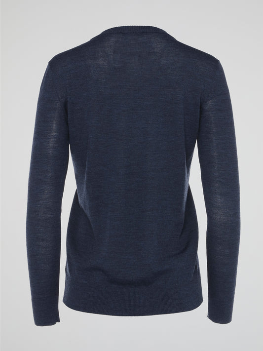 Wrap yourself in effortless style with the Navy Long Sleeve Top by Akris Punto. Crafted with the utmost attention to detail, this versatile piece exudes sophistication whilst offering unrivaled comfort. Elevate your wardrobe and make a statement with this chic and timeless addition that seamlessly takes you from day to night.