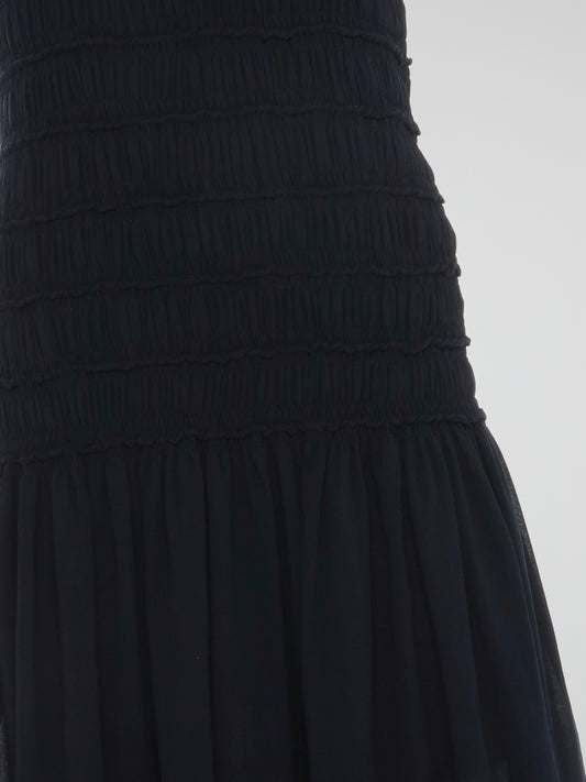 Introducing the Black Smock Dress from Akris Punto - a bold and empowering fashion statement that effortlessly combines comfort and style. Crafted with exquisite attention to detail, this dress features a loose-fit silhouette accentuated by delicate smocking, allowing you to move with grace and confidence. Whether you're conquering the boardroom or conquering the dance floor, this versatile piece ensures you always feel like the fearless fashionista you are.