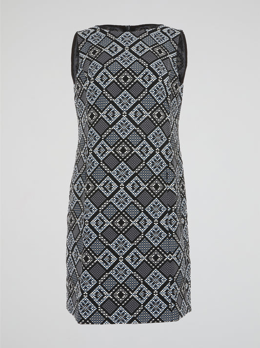 Step into a realm of elegance with our Grey Checkered Mini Dress by Akris Punto, where traditional patterns meet contemporary style. Crafted with precision and attention to detail, this dress showcases a flattering silhouette that effortlessly accentuates your curves. As you glide through any occasion, the sophisticated checkered design exudes confidence and leaves a lasting impression.