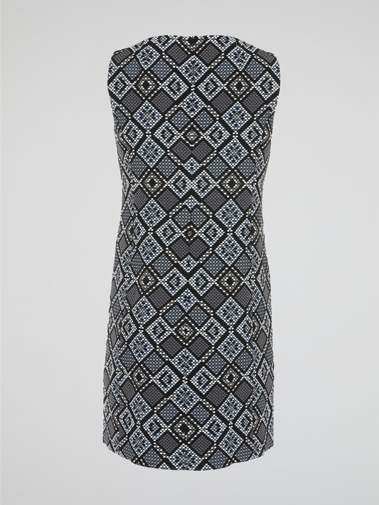 Step into a realm of elegance with our Grey Checkered Mini Dress by Akris Punto, where traditional patterns meet contemporary style. Crafted with precision and attention to detail, this dress showcases a flattering silhouette that effortlessly accentuates your curves. As you glide through any occasion, the sophisticated checkered design exudes confidence and leaves a lasting impression.