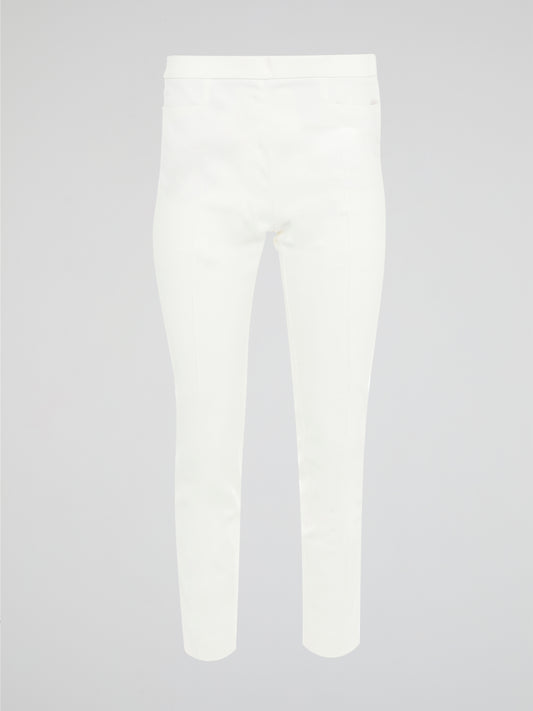 Get ready to turn heads with these stunning White Skinny Fit Trousers by Akris Punto! Designed to flatter every curve, these trousers hug your body in all the right places, giving you a sleek and elegant silhouette. Perfect for both casual and formal occasions, these versatile pants are a must-have addition to your wardrobe!