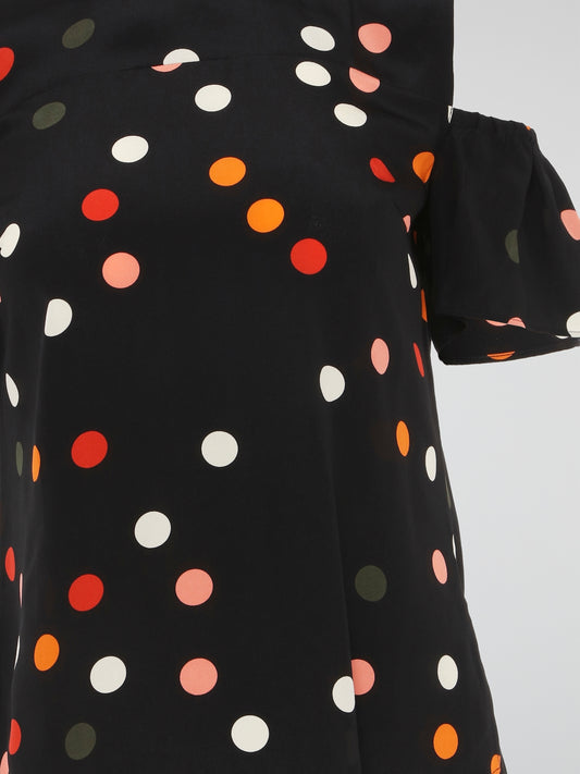 The Black Polka Dot Cold Shoulder Top by Akris Punto is a chic and playful addition to your wardrobe. With its trendy cold shoulder cutouts and flirty polka dot print, this top adds a touch of flair to any outfit. Made with high-quality materials, it offers both comfort and style, making it the perfect choice for a night out or a casual day at the office.