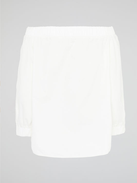 Elevate your summer wardrobe with our White Off-Shoulder Top by Akris Punto. Embrace a touch of effortless elegance as the delicate fabric gracefully drapes off your shoulders, exuding femininity and style. With its versatile design, this top is perfect for both casual outings and special occasions, ensuring you always feel chic and glamorous wherever you go.