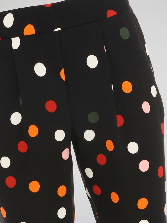 Step out in style with these Black Polka Dot Pleated Trousers from Akris Punto, a perfect blend of sophistication and playfulness. Crafted with meticulous attention to detail, these trousers feature a flattering pleated design that effortlessly elongates your silhouette. The whimsical polka dot pattern adds a touch of fun to your outfit, making these trousers a must-have for any fashion-forward individual.