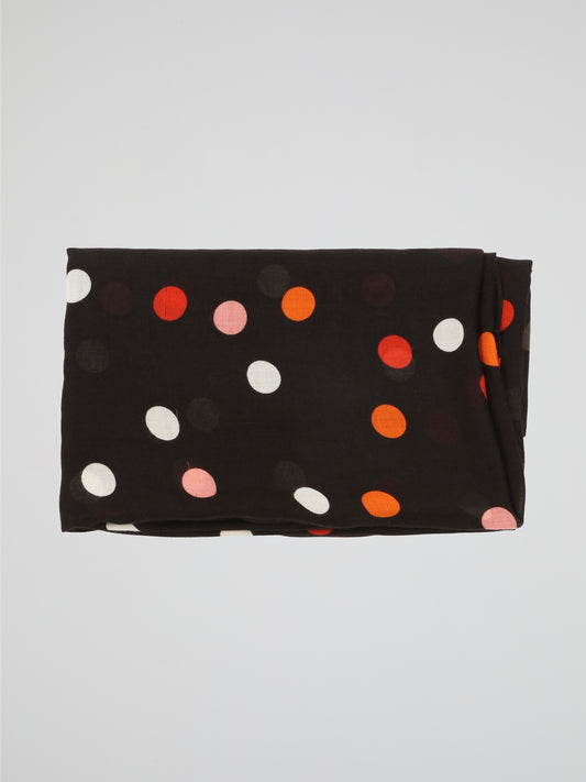 Wrap yourself in style with the Black Polka Dot Scarf from Akris Punto. This enchanting accessory is a perfect blend of elegance and playfulness, adding a touch of whimsy to any outfit. Crafted from luxurious materials, it boasts a timeless design that effortlessly elevates your fashion game.