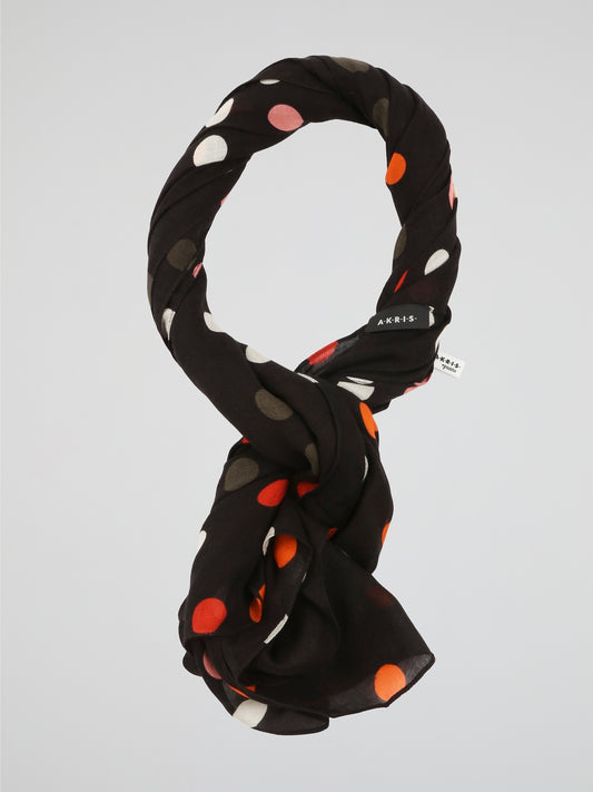 Wrap yourself in style with the Black Polka Dot Scarf from Akris Punto. This enchanting accessory is a perfect blend of elegance and playfulness, adding a touch of whimsy to any outfit. Crafted from luxurious materials, it boasts a timeless design that effortlessly elevates your fashion game.