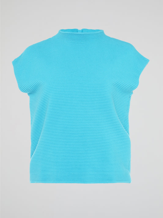 Step up your fashion game with the Blue Knitted Top by Akris Punto. Crafted with love and attention to detail, this unique piece combines comfort and style effortlessly. Its vibrant blue color and intricate knitted pattern will make you the center of attention wherever you go, leaving a lasting impression on everyone.