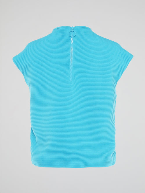 Step up your fashion game with the Blue Knitted Top by Akris Punto. Crafted with love and attention to detail, this unique piece combines comfort and style effortlessly. Its vibrant blue color and intricate knitted pattern will make you the center of attention wherever you go, leaving a lasting impression on everyone.