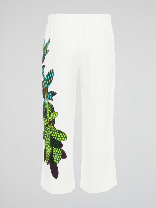 Step into a world of elegance and style with the White Printed Cropped Trousers by Akris Punto. These exquisite trousers feature a unique print that effortlessly combines sophistication with a touch of playfulness. Crafted from premium materials, they offer both comfort and a flattering fit, making them a chic choice for any fashion-forward individual.