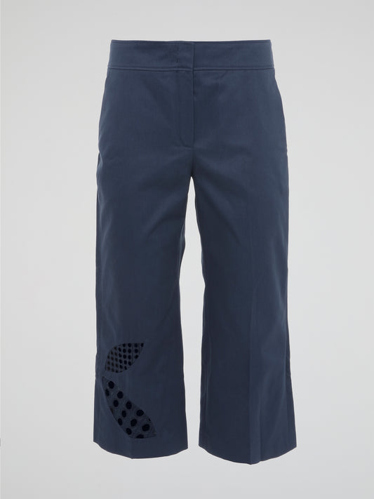 Step into style with these chic Navy Cropped Trousers by Akris Punto. Designed to elevate your everyday wardrobe, these pants boast a flattering cropped silhouette that effortlessly flirts with fashion-forwardness. Crafted with precision, these trousers combine comfort and sophistication, making them a must-have addition to any modern woman's closet.