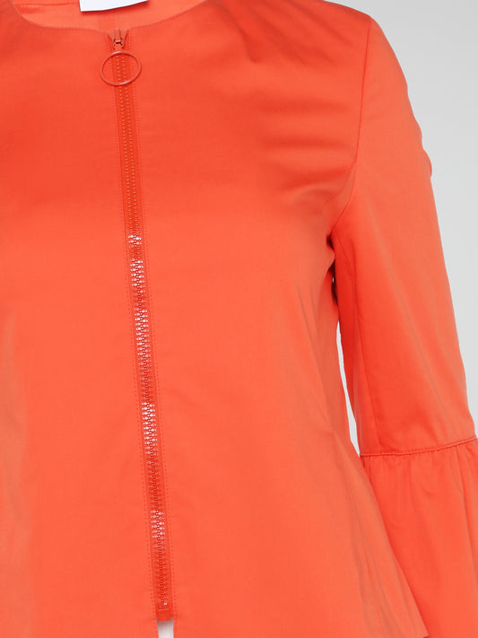 Step into the vibrant world of fashion with our Orange Flared Cuff Top by Akris Punto. This striking masterpiece will make you the center of attention, combining clean lines with an audacious pop of color. The flared cuffs add a playful touch, elevating your style to new heights while bringing out your inner confidence.