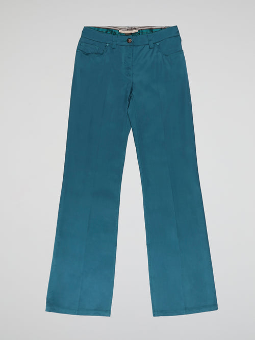 Get ready to turn heads with these Teal Wide Leg Pants by Clas Roberto Cavalli! The vibrant teal color adds an element of boldness to your outfit, while the wide leg design effortlessly exudes a chic and sophisticated vibe. Crafted with the utmost attention to detail, these pants ensure both comfort and style, perfect for any occasion.