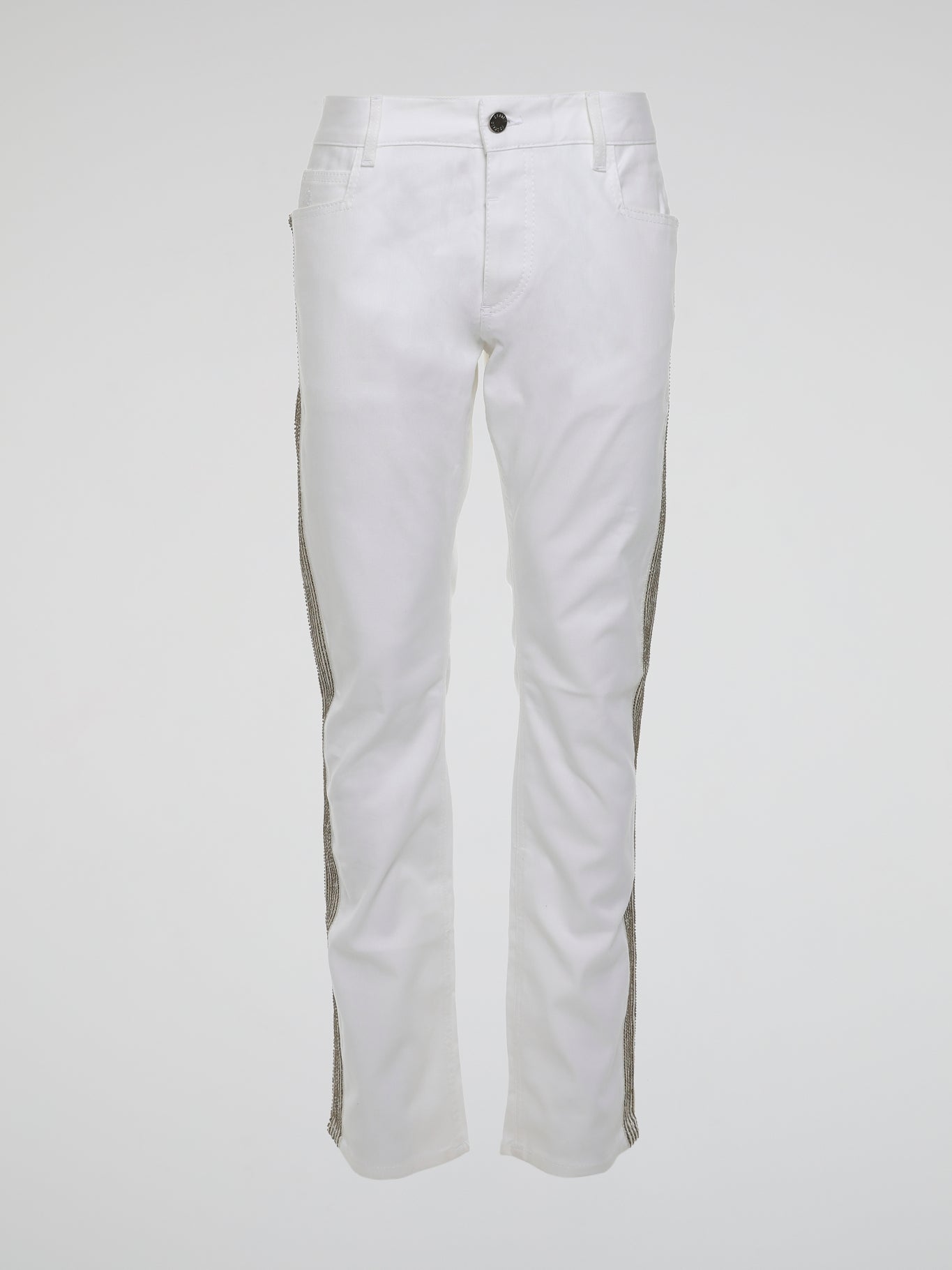 Step into the realm of high fashion with these White Studded Trousers by Roberto Cavalli. Made for those who dare to be different, these trousers feature meticulous studded details that add a touch of rebellious glamour. With their sleek design and luxurious fabric, they are the ultimate statement piece for any fashion-forward individual.