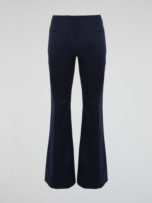 Step into the realm of timeless elegance with our Navy Flared Trousers by Roberto Cavalli. Crafted with impeccable precision, these trousers effortlessly blend classic sophistication with a modern twist. The flawless flared silhouette enhances your every move, making these trousers a captivating statement piece for any occasion.