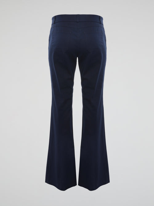 Step into the realm of timeless elegance with our Navy Flared Trousers by Roberto Cavalli. Crafted with impeccable precision, these trousers effortlessly blend classic sophistication with a modern twist. The flawless flared silhouette enhances your every move, making these trousers a captivating statement piece for any occasion.