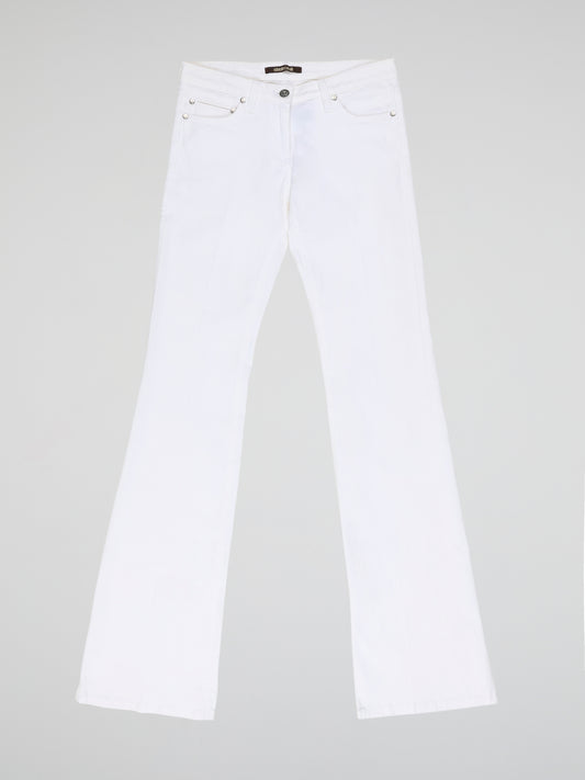 Step into fashion-forward elegance with these White Flared Jeans from renowned designer Roberto Cavalli. Crafted with meticulous attention to detail, these jeans feature a flattering high waistline and a mesmerizing flared silhouette that effortlessly elongates your legs. The pure white hue adds a touch of sophistication, making them the perfect statement piece for any occasion.